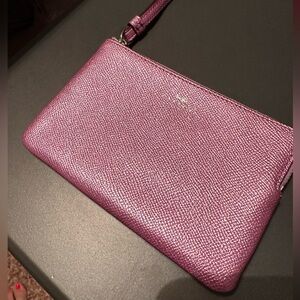 Coach pink metallic wristlet